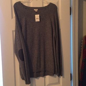 J crew sweater with leather elbow pads.